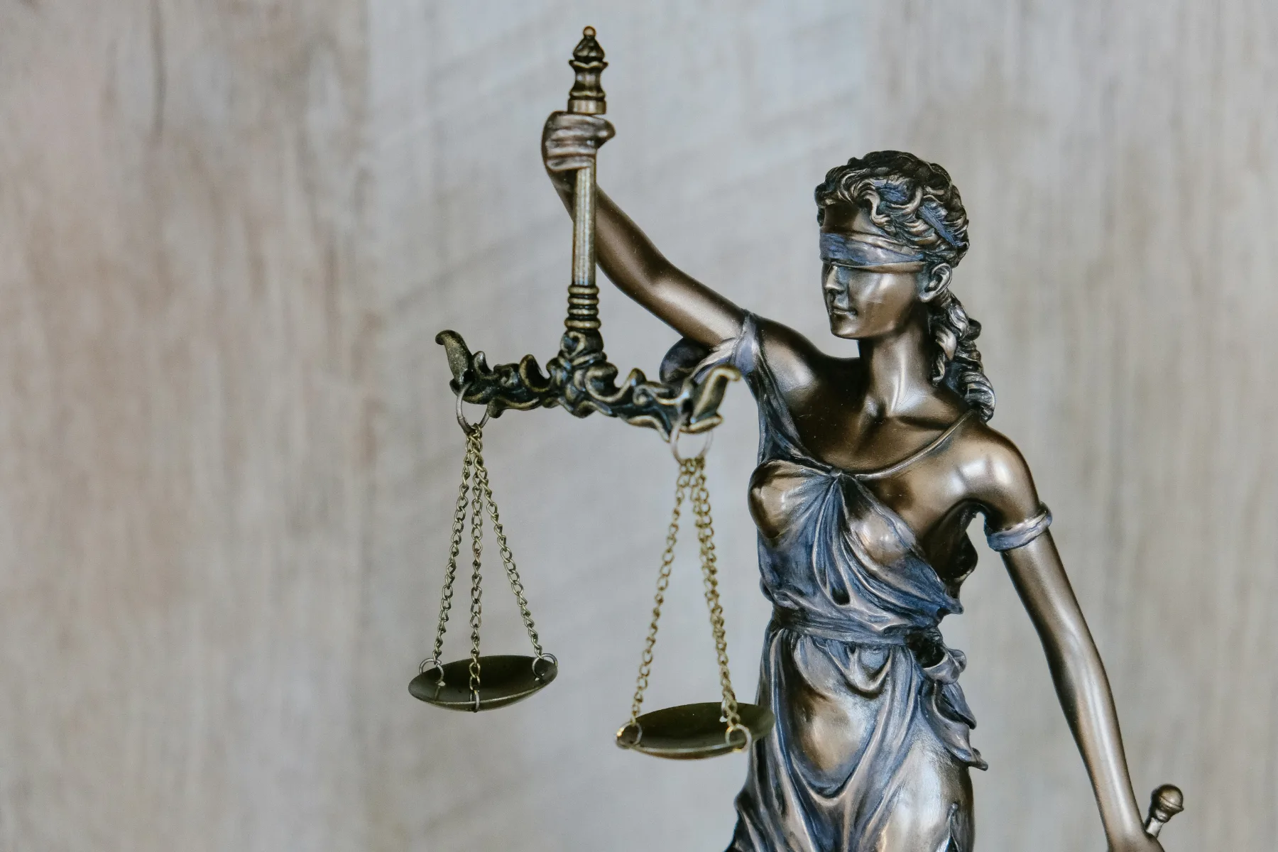 Lady Justice sculpture representing careful legal counsel